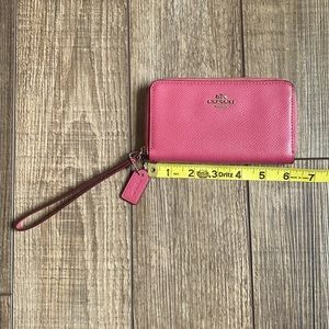 Pink coach wristlet